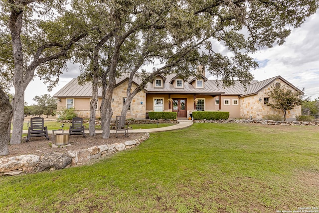 view of front of property with a front lawn