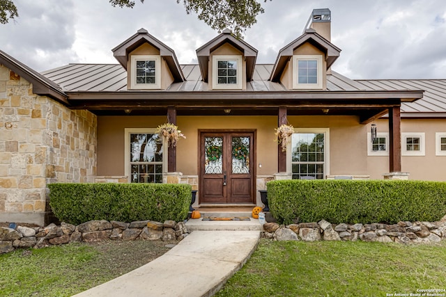 doorway to property with a porch