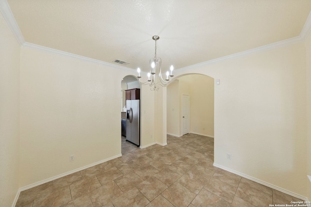 unfurnished dining area featuring crown molding and a notable chandelier