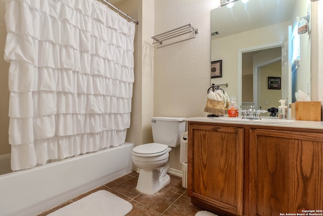 full bathroom with vanity, toilet, tile patterned floors, and shower / bath combination with curtain