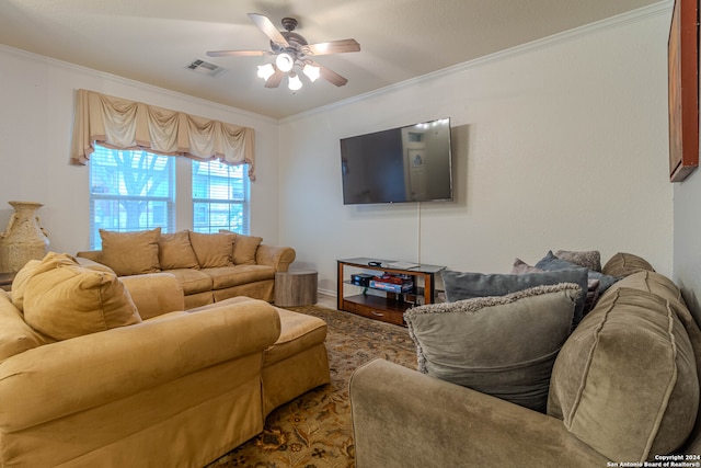 living room with crown molding and ceiling fan