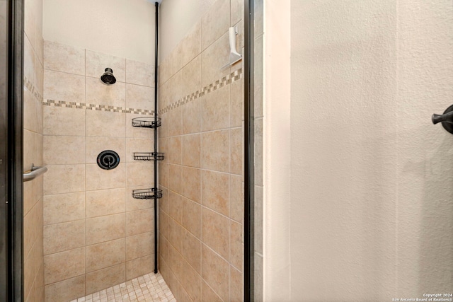 bathroom with an enclosed shower