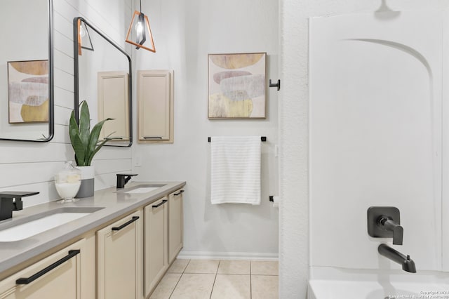 bathroom with vanity and tile patterned flooring