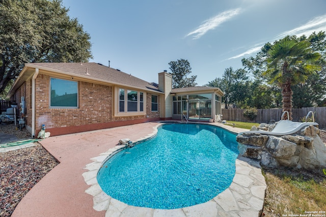 view of swimming pool featuring a patio