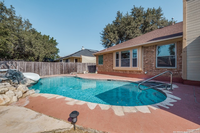 view of pool with a patio area