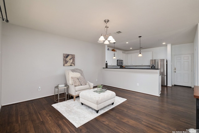 6720 Marble Lk, Live Oak, TX 78233 - living area with recessed lighting, dark wood-style floors, and a chandelier