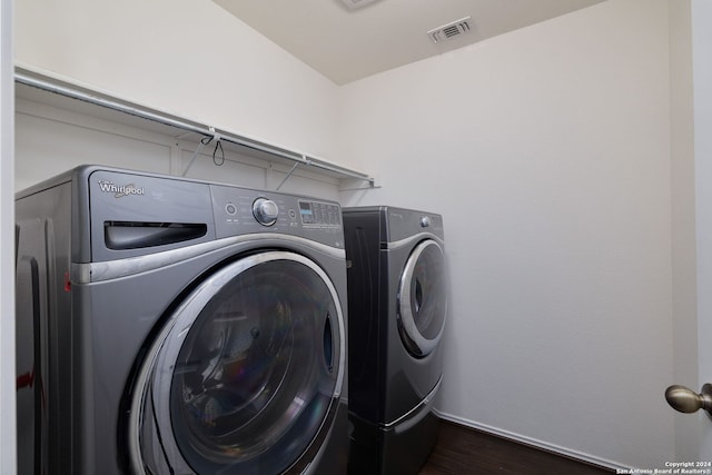 6720 Marble Lk, Live Oak, TX 78233 - washroom with independent washer and dryer and dark wood-style floors