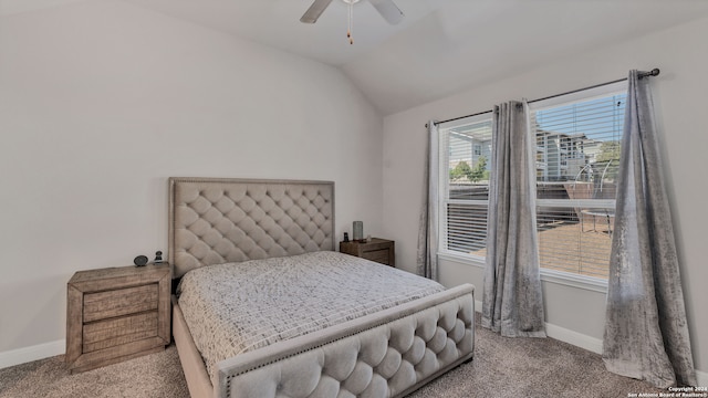 bedroom featuring ceiling fan, light carpet, and lofted ceiling