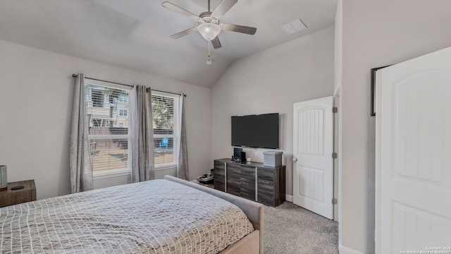 carpeted bedroom with lofted ceiling and ceiling fan