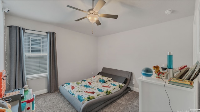 bedroom with ceiling fan and light colored carpet