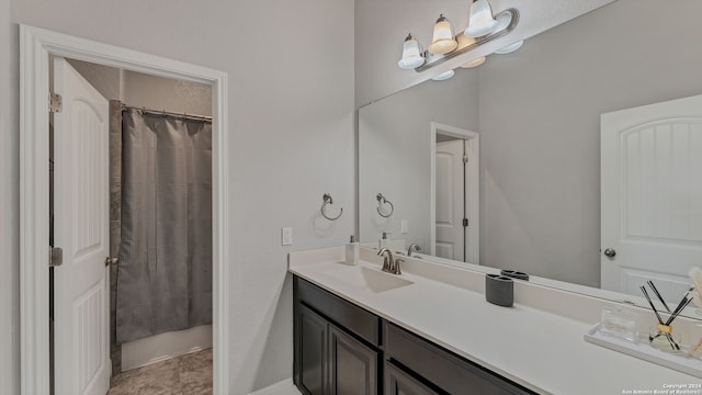 bathroom featuring vanity and walk in shower