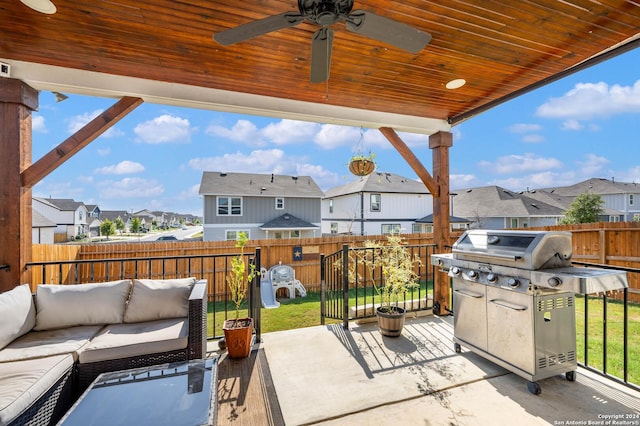 view of patio / terrace with a ceiling fan, an outdoor hangout area, a fenced backyard, area for grilling, and a residential view