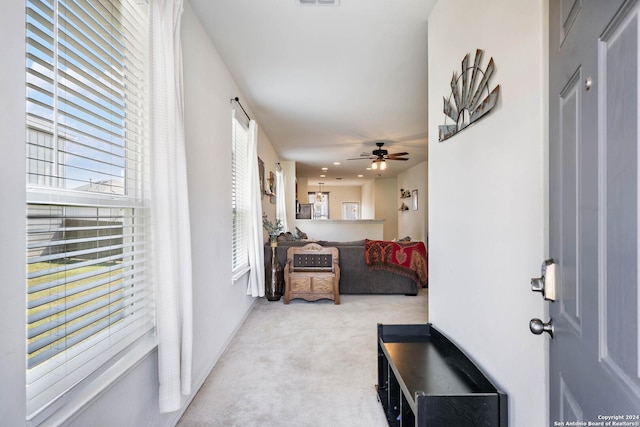 interior space featuring visible vents and carpet flooring