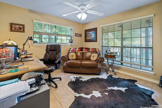 tiled office space with ceiling fan