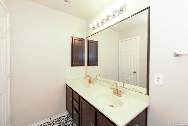 bathroom featuring vanity and tile patterned flooring