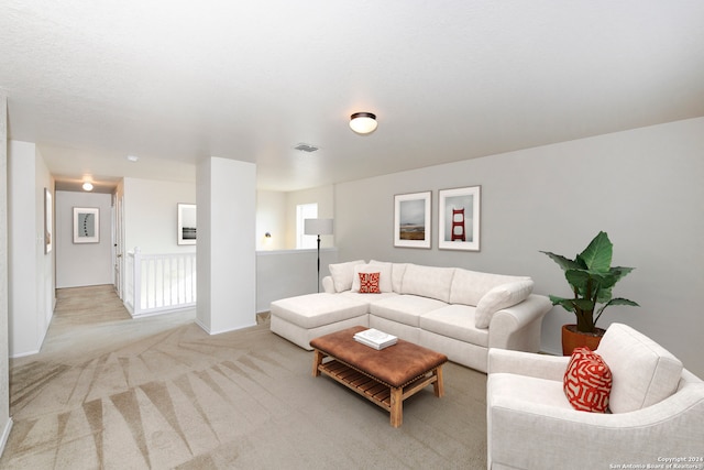 living room with light colored carpet