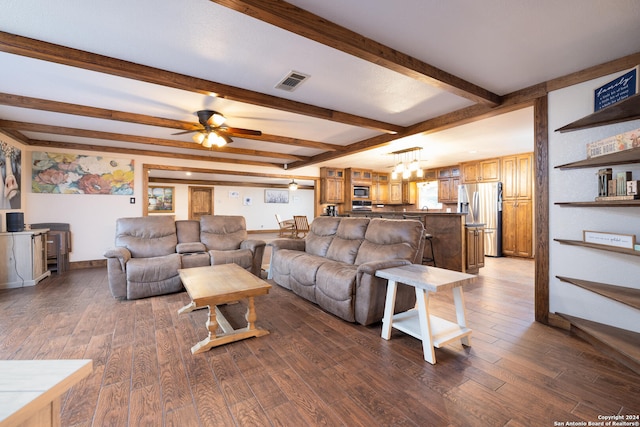 living room with dark wood-type flooring, ceiling fan, and beamed ceiling