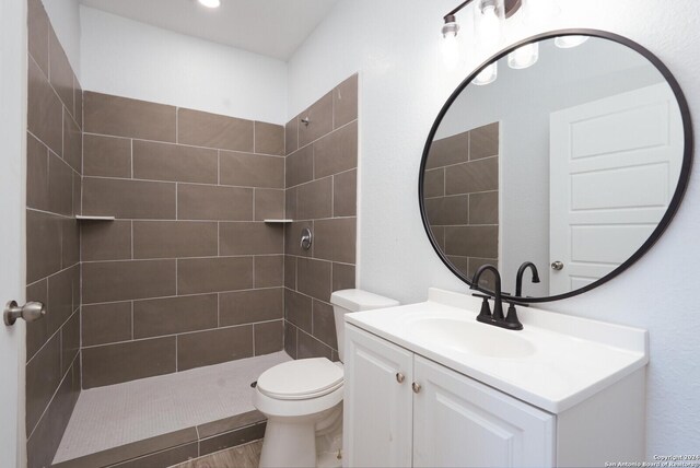23238 Copper Canyon Dr, Elmendorf, TX 78112 - full bath with a tile shower, toilet, and vanity