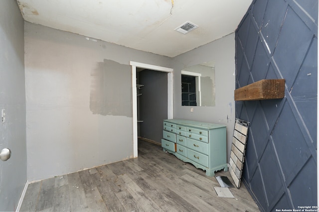 interior space with a closet and light wood-type flooring