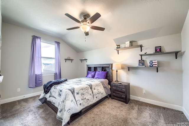 bedroom featuring lofted ceiling, carpet floors, and ceiling fan