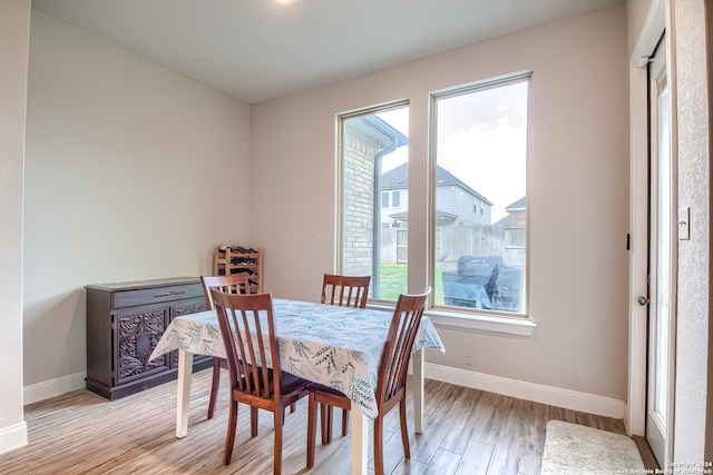 dining room featuring light hardwood / wood-style flooring