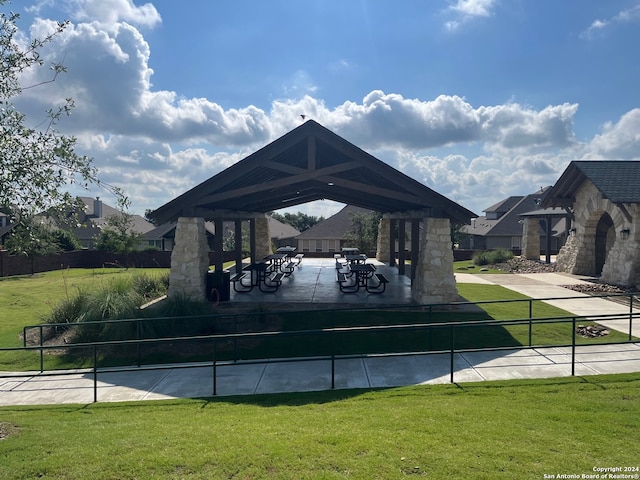 view of community with a gazebo and a yard