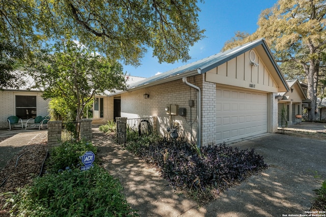 view of side of property featuring a garage