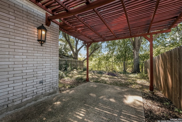 view of patio featuring a pergola