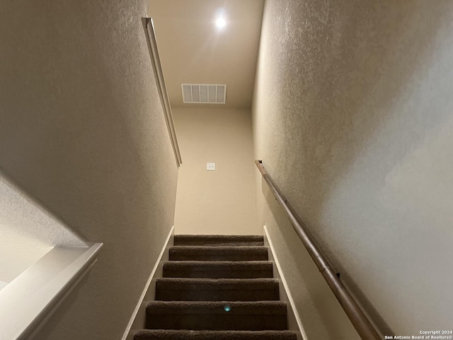 6614 Mia Way, San Antonio, TX 78233 - stairs with a textured wall