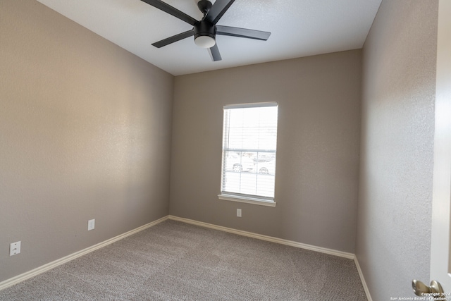 unfurnished room featuring carpet floors and ceiling fan