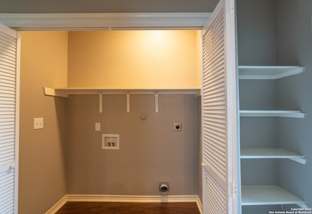 laundry area featuring hookup for an electric dryer, hookup for a gas dryer, dark hardwood / wood-style flooring, and hookup for a washing machine