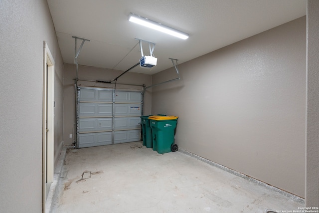 garage featuring a garage door opener