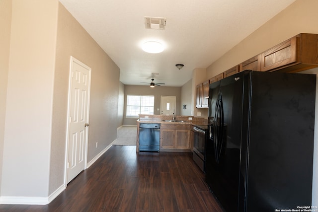 kitchen with black refrigerator with ice dispenser, dishwashing machine, ceiling fan, sink, and electric range