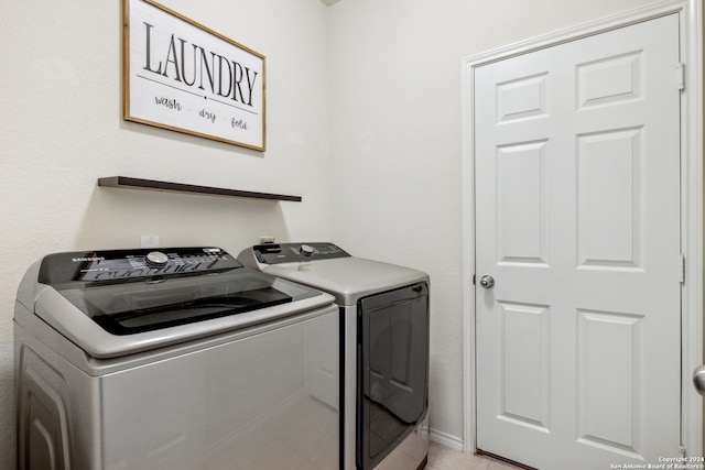 laundry room with washer and clothes dryer