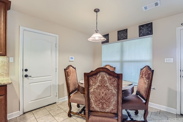 view of tiled dining room