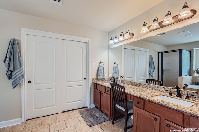 bathroom with vanity and walk in shower