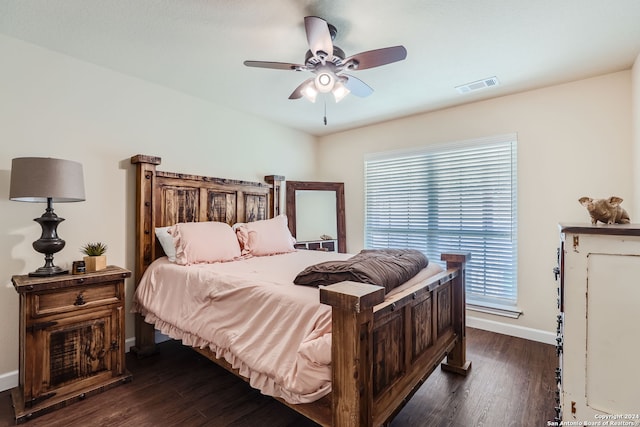 bedroom featuring ceiling fan and dark hardwood / wood-style flooring