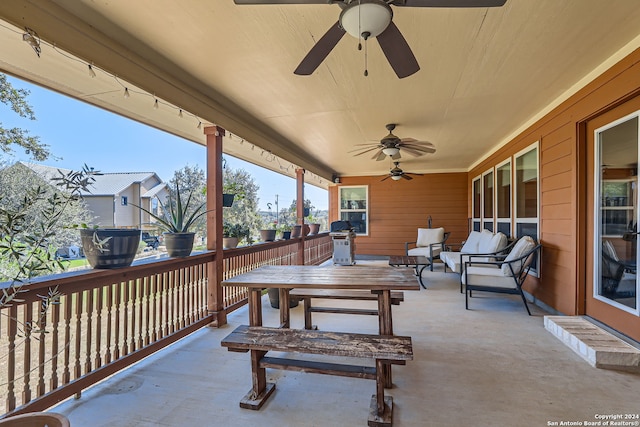 view of patio / terrace featuring a grill and ceiling fan