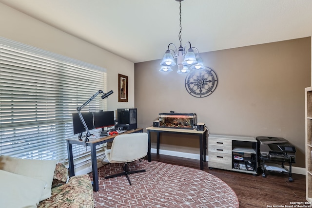 office space featuring a notable chandelier and dark hardwood / wood-style flooring