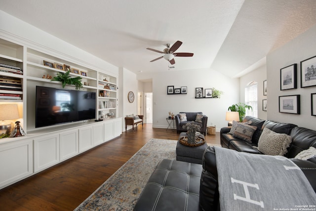 living room featuring lofted ceiling, ceiling fan, a textured ceiling, and dark hardwood / wood-style flooring