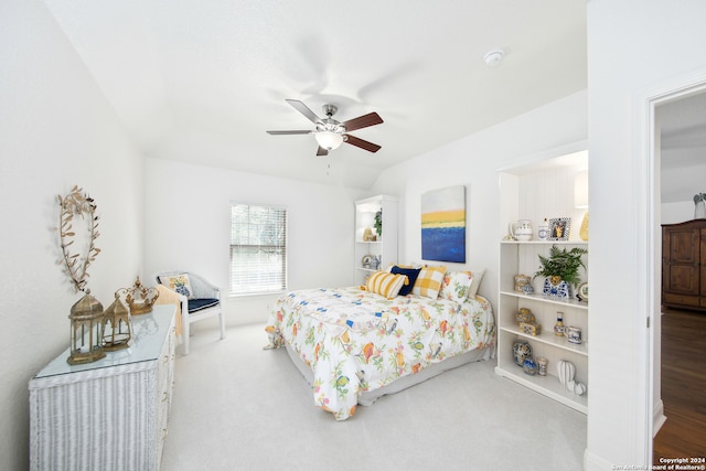 bedroom featuring ceiling fan and carpet floors