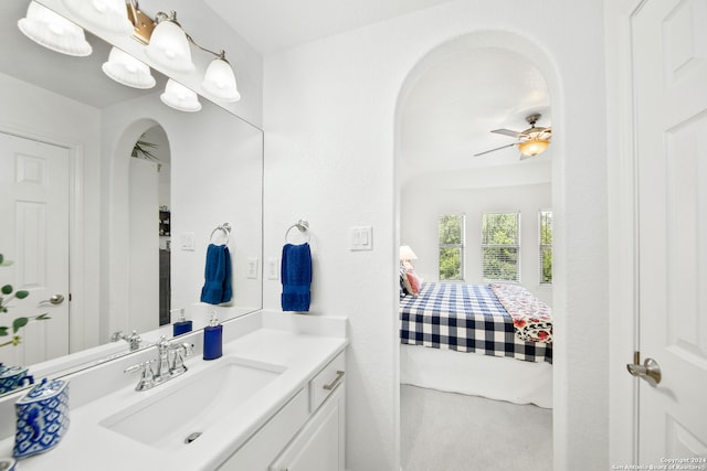 bathroom featuring vanity and ceiling fan