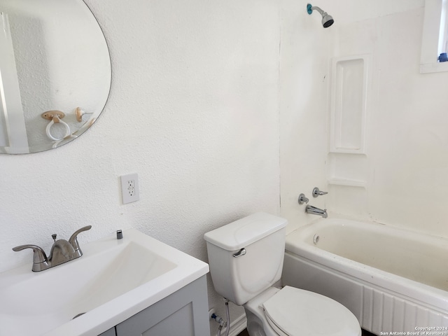 full bath with toilet, vanity, and shower / bathing tub combination