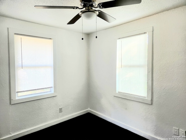 empty room with ceiling fan