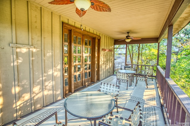 exterior space with ceiling fan