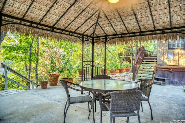 view of patio with a gazebo and a hot tub