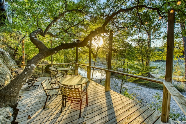 deck featuring a water view