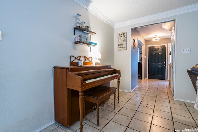 misc room featuring ornamental molding and light tile patterned floors