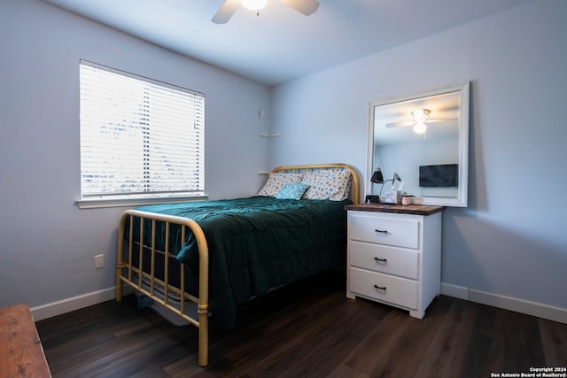 bedroom featuring ceiling fan and dark hardwood / wood-style flooring