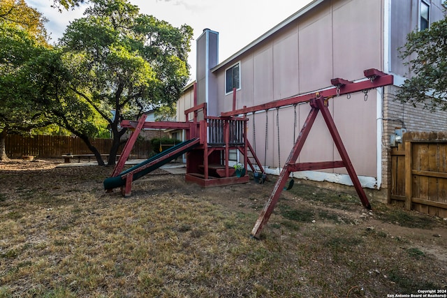 view of playground featuring a lawn